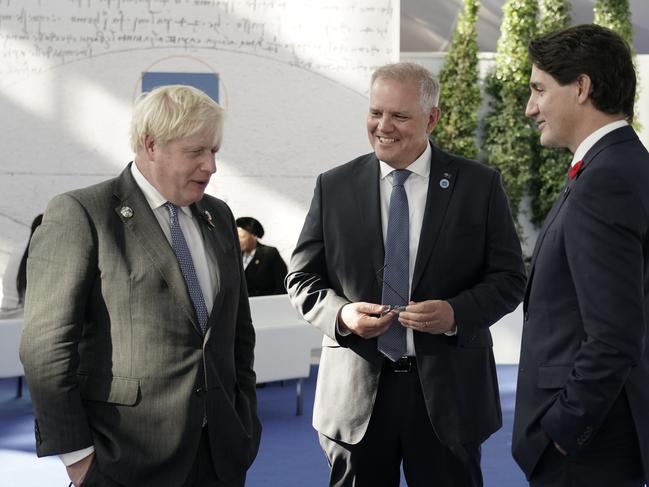 Australian Prime Minister Scott Morrison attends the G20 Official Welcome and Family photo and chats with Boris Johnson and Justin Trudeau in Rome on Saturday, October 30, 2021. Picture: Adam Taylor