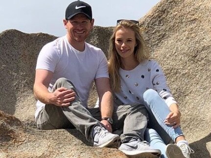 Tara Ridgway with fiance Eoin Morgan at Remarkable Rocks, Kangaroo Island. Picture: Instagram.