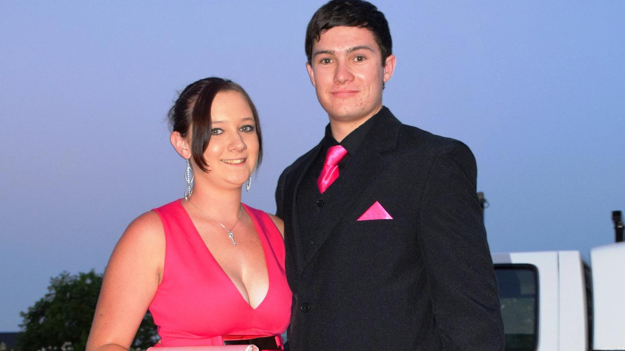 Tahlia Vercoe and Corey Smith pose for the cameras at the Roma State College formal. Photo Tom Gillespie / The Western Star