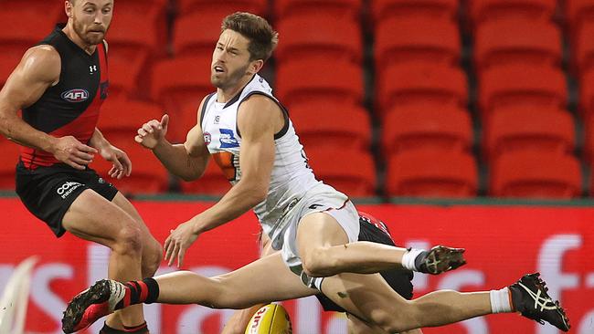 GWS Giant Callan Ward’s controversial moment at Metricon Stadium that earned a free kick for the winning goal. Picture: Michael Klein