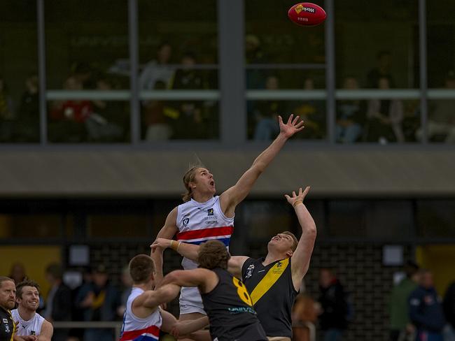 First ruck contest for the game at RF Miles Reserve on Saturday. Pic: Chris Thomas