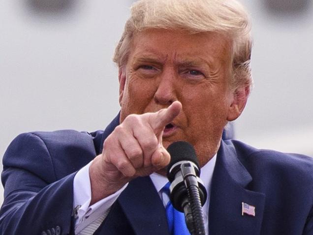 GREENVILLE, NC - OCTOBER 15: President Donald Trump makes remarks about the media during a Make America Great Again rally at the Pitt-Greenville Airport on October 15, 2020 in Greenville, North Carolina. Thousands of people joined to listen to the President 19 days before the 2020 presidential election.   Melissa Sue Gerrits/Getty Images/AFP == FOR NEWSPAPERS, INTERNET, TELCOS & TELEVISION USE ONLY ==