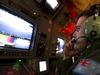 Royal Australian Air Force (RAAF) airborne electronics analyst Sergeant Samuel Carson uses the advanced camera systems on board an AP-C3 Orion aircraft to search for evidence of Malaysia Airlines flight MH370 over the southern Indian Ocean.