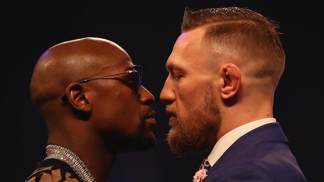 Floyd Mayweather Jr. and Conor McGregor come face-to-face.