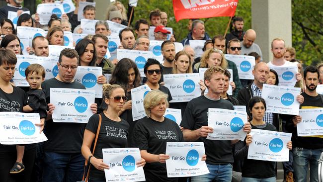 Editorial staff from The Age rally outside the newspaper’s Melbourne headquarters yesterday.