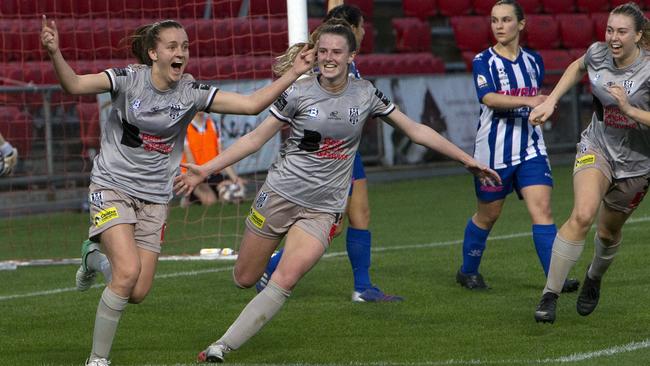 Adelaide City’s Isabel Hodgson celebrates her goal during last year’s WNPL grand final in a 2-1 win over West Adelaide. (AAP/Emma Brasier)