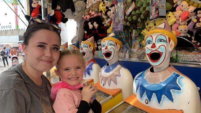 Jennaya Hodges and her daughter Aria Hartley prepare to play the laughing clowns at the Mackay Show on Thursday, June 16. Picture: Duncan Evans