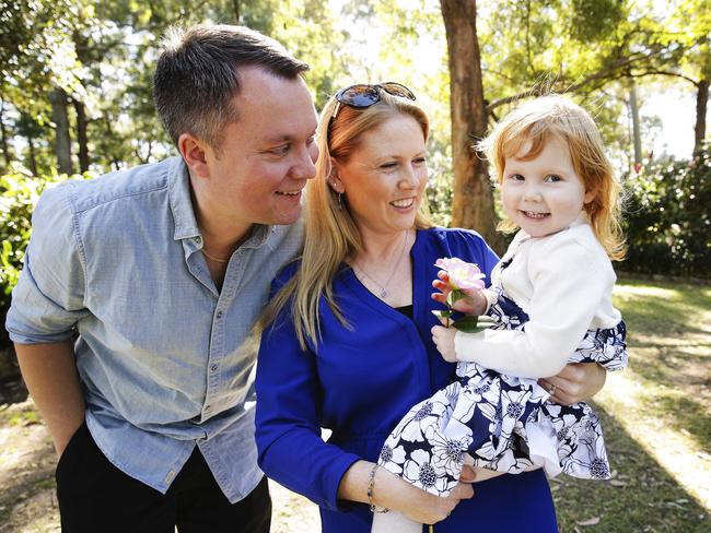 Parents Saasha and Simon Scaife with their daughter Charlotte, 2. Picture: Justin Lloyd.