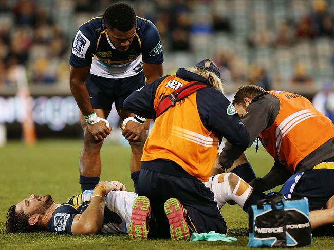 Sam Carter is injured during the round 16 Super Rugby match between the Brumbies and the Bulls at GIO Stadium.