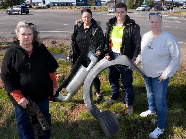 Locals in the Angle Vale area, (LtoR) Bronwyn Coulter, Cathy-Jo Tame, Jon Raymond, and Sarah Baker, have seen firsthand how quickly Playford has grown over the years and say the roads have not been upgraded to accomodate the new residents and associated traffic. They are now campaigning for significant investment into the area to fix key roads. Pictured here at the intersection of Heaslip Road and Curtis Road, with debris from a recent accident. They say there is an accident here almost weekly. 27 July 2024. Picture Dean Martin