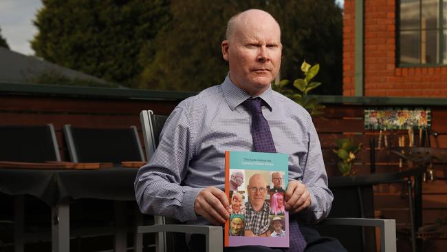 Lawrence Dooley who is in his 50's and lives with cerebral palsy has written a book with the assistance of his mum Lorraine. Picture: Nikki Davis-Jones