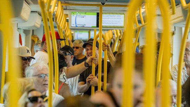 Opening morning of the Stage 2 of the Gold Coast light rail (g:link). Passengers riding the light rail to the new Helensvale Station. Picture: Jerad Williams