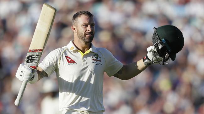 Matthew Wade celebrates scoring a century during the fourth day of the fifth Ashes test match between England and Australia at The Oval cricket ground.