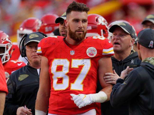 KANSAS CITY, MO - NOVEMBER 6: Tight end Travis Kelce #87 of the Kansas City Chiefs stands on the sidelines while head coach Andy Reid discusses the play with officials after Kelsey was ejected on a play against the Jacksonville Jaguars at Arrowhead Stadium during the fourth quarter of the game on November 6, 2016 in Kansas City, Missouri. Jamie Squire/Getty Images/AFP == FOR NEWSPAPERS, INTERNET, TELCOS & TELEVISION USE ONLY ==