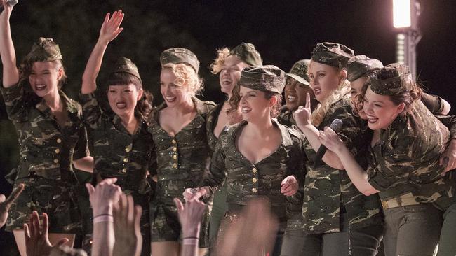 The Barden Bellas entertain the US military in a scene from "Pitch Perfect 3."