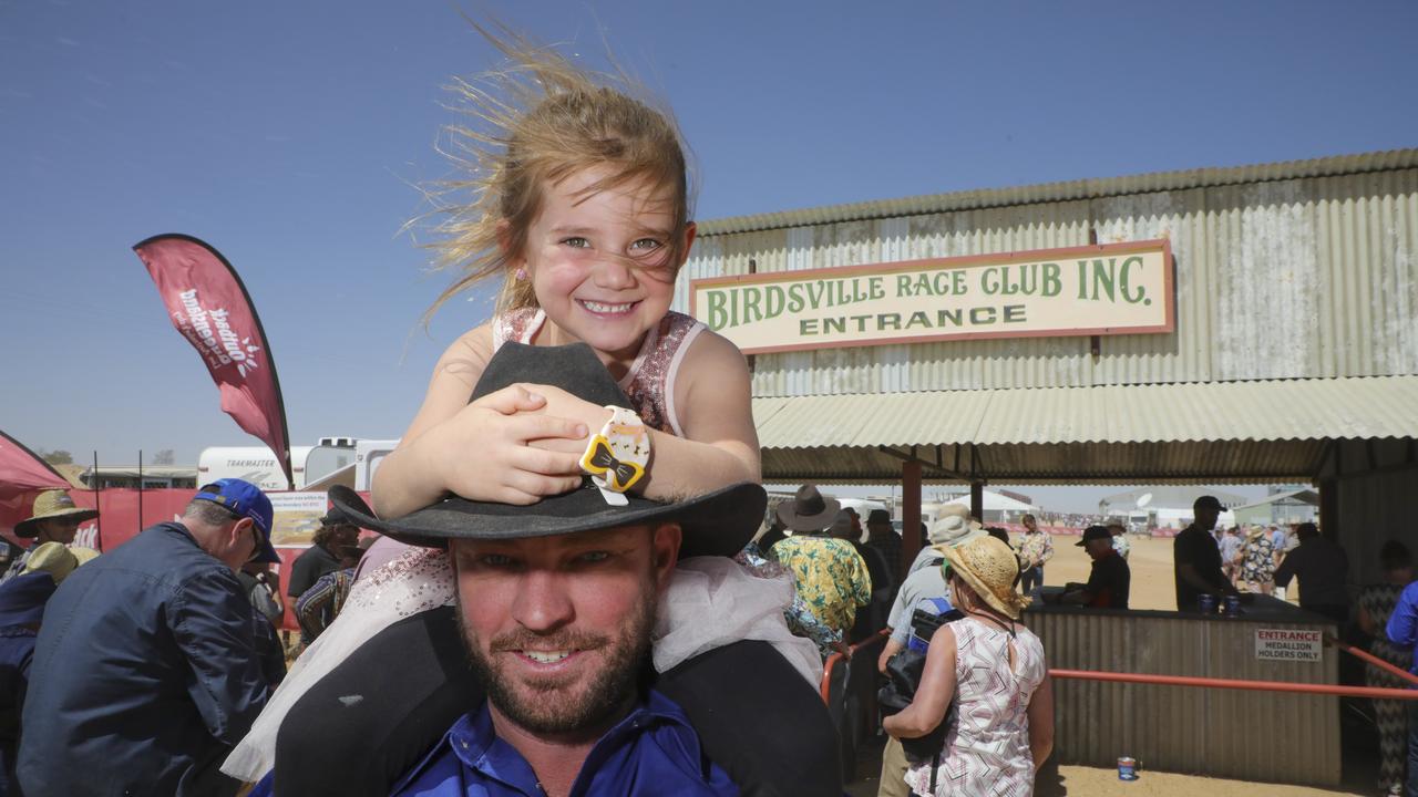 Shane Henderson and his daughter Isebel, 5, from Casino, are living it up at the Birdsville races. Picture: Salty Dingo