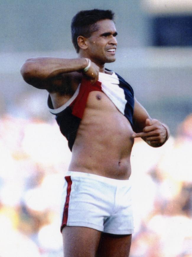 AFL player Nicky Winmar dealt with racial abuse throughout his career.