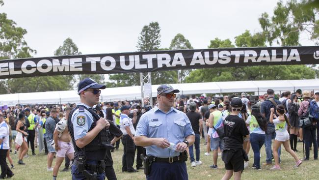 Police patrol the entrance at the 2019 Ultra Music Festival. Picture: Damian Shaw