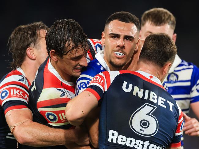 SYDNEY, AUSTRALIA - MAY 16: Jacob Kiraz of the Bulldogs is tackled during the round eleven NRL match between Bulldogs and Roosters at Accor Stadium, on May 16, 2025, in Sydney, Australia. (Photo by Mark Evans/Getty Images)