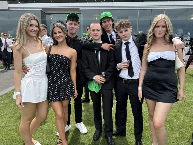 Maeve Gunning, Jemma Billing, Finn Ryan, Satchmo Kennedy, Oliver Pullin, Xavier Smith and Elena Kleinschmidt at Flemington for Derby Day on November 2, 2024. Picture: Phillippa Butt