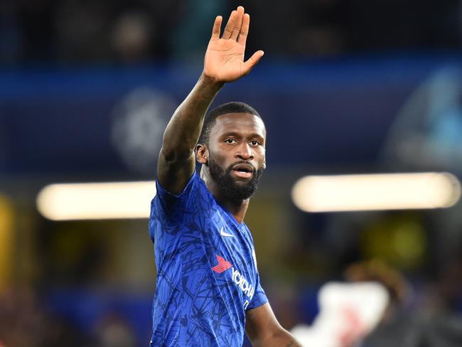 Chelsea's German defender Antonio Rudiger gestures on the pitch after the UEFA Champion's League Group H football match between Chelsea and Lille at Stamford Bridge in London on December 10, 2019. - Chelsea won the  game 2-1, and qualified for the knock-out stages. (Photo by Glyn KIRK / AFP)