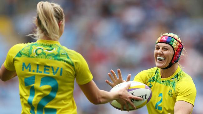 Maddison Levi of Team Australia is congratulated by teammate Sharni Williams