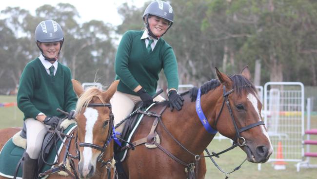 Emma and Jessica Galea at a zone showjumping event at the Hills District Pony Club, which could be forced to close for new sporting fields. 