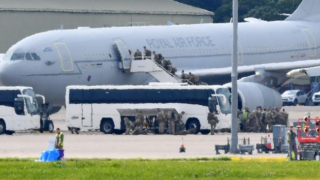 Members of the British Army board a RAF Airbus en route to Afghanistan. Picture: AFP.