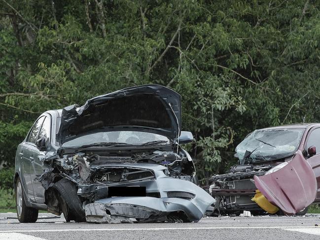 The scene of a fatal two-vehicle collision on McMillans Road in Knuckey Lagoon on Saturday. Picture: Glenn Campbell