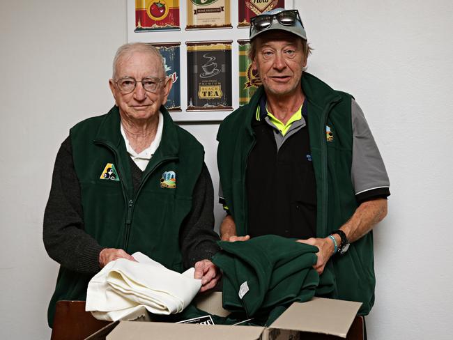 Richard Clarke and Ross Aldridge were packing up memorabilia at North Manly Bowls Club. Picture: Adam Yip.