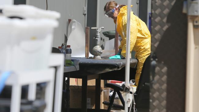 SA police working at the scene of a meth lab bust in Adelaide. Picture: AAP / Kelly Barnes