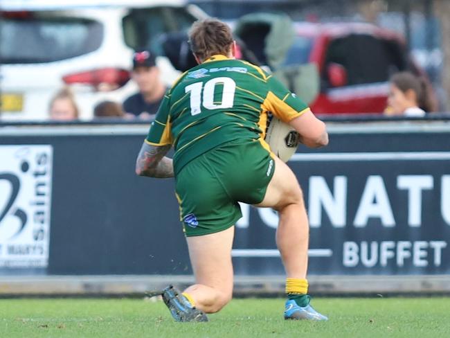 Eton Lindsay scores a try for Windsor in the 2023 grand final. Picture: Steve Montgomery