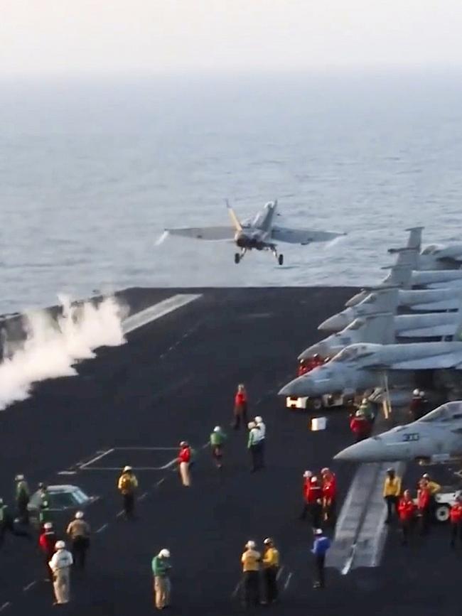 An aircraft launching from the USS Harry S. Truman in the Red Sea before airstrikes in Sanaa, Yemen. Picture: U.S. Navy via AP