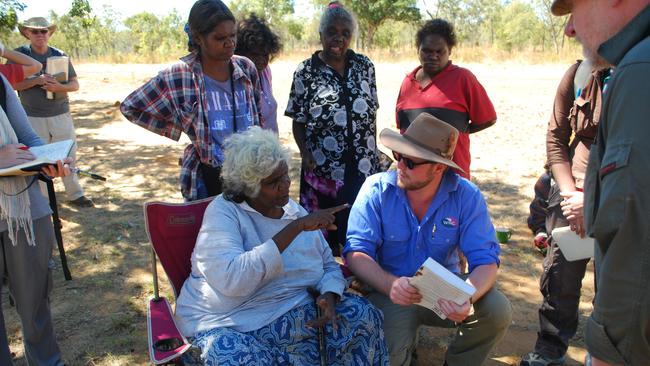 Jocelyn McCartney talks with Flinders University PhD candidate, Jordan Ralph. (back — front) Robert Jones, Sabrina Moreen, Nell Brown, Ester Bulumbara, Veronica Moreen, and Peter Birt. PICTURE: Claire Smith