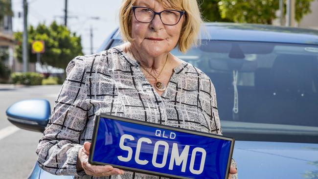 Gold Coast Councillor Dawn Crichlow with her "SCOMO" number plates that she wants to sell to Prime Minister Scott Morrison. Picture: Jerad Williams