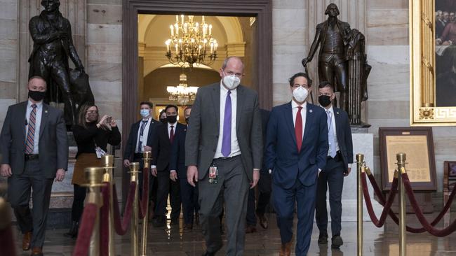 Jamie Raskin (R) leads fellow House Impeachment Managers through the Capitol Rotunda to the Senate chamber ahead of trial proceedings. Picture: AFP.