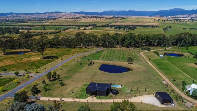 The sprawling property features an apple orchard.