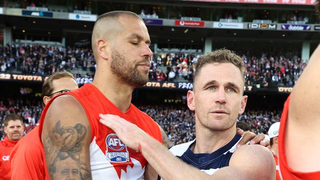 Buddy congratulates Joel Selwood. Picture by Michael Klein