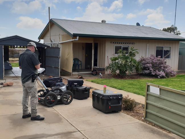 Police search the same property decades later. Picture: SA Police