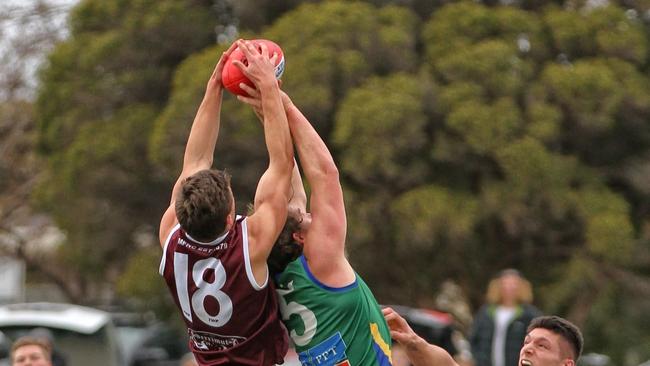 Melton and Lake Wendouree players fly for the mark. Picture: Aaron Cook