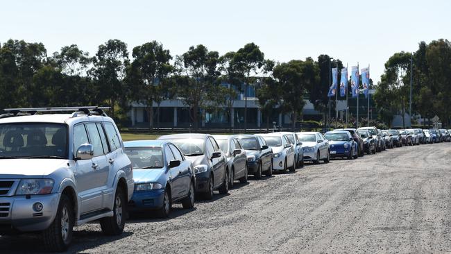 Police are dishing out fines to hundreds of drivers parked illegally at South Morang Station. Picture: Kylie Else