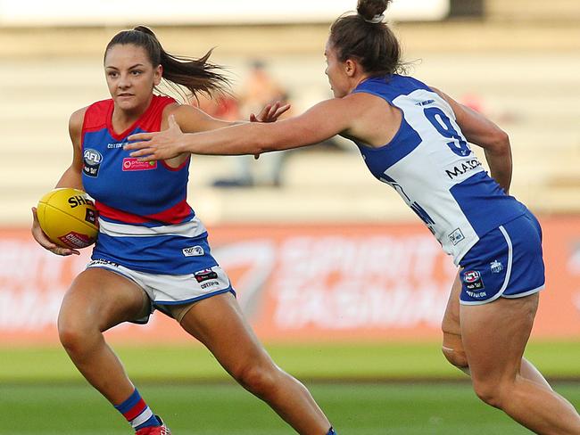 LAUNCESTON, AUSTRALIA - FEBRUARY 15: Monique Conti of the Bulldogs (L) in action during the round three AFLW match between the North Melbourne Kangaroos and the Western Bulldogs at the University of Tasmania Stadium on February 15, 2019 in Launceston, Australia. (Photo by Graham Denholm/Getty Images)