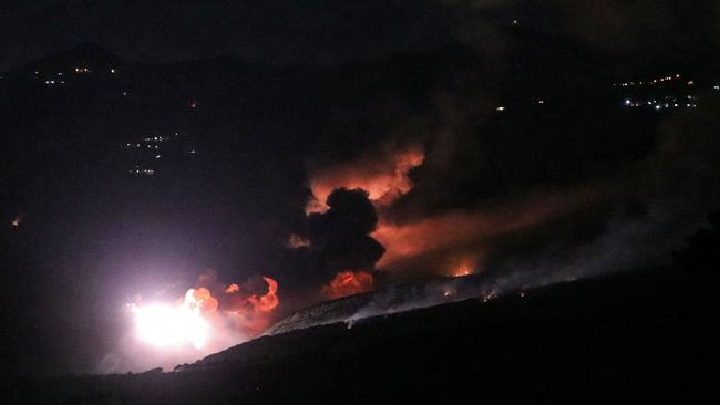 Smoke and fire rise from the site of an Israeli strike on the southern Lebanese border village of Mahmoudiyeh on Thursday. Picture: AFP