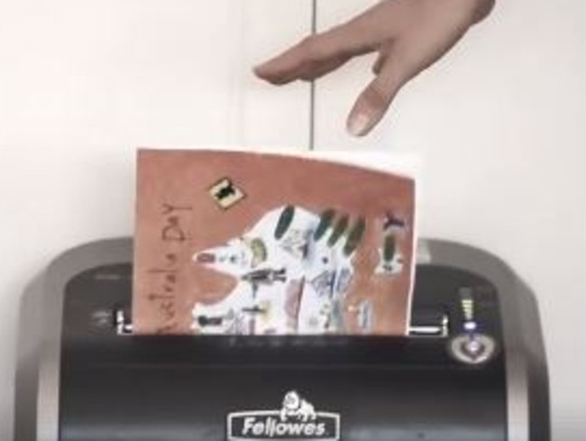 Part of Mark Latham's new Australia Day TV ad, which shows a handmade Australia Day card being put in a paper shredder. Picture: Supplied