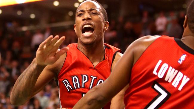 DeMar DeRozan #10 of the Toronto Raptors reacts after a dunk in the second half.