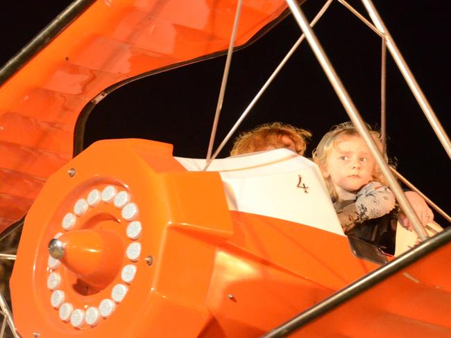 Sam Whitney peered out from the plane ride at the Charters Towers Show. Picture: Trudy Brown