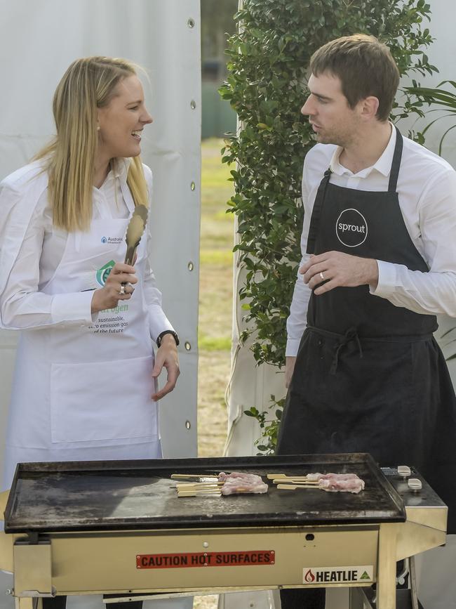 AGIG head of strategy Kristin Raman and Sprout chef Callum Hann test a hydrogen-powered barbecue. Picture: Roy VanDerVegt