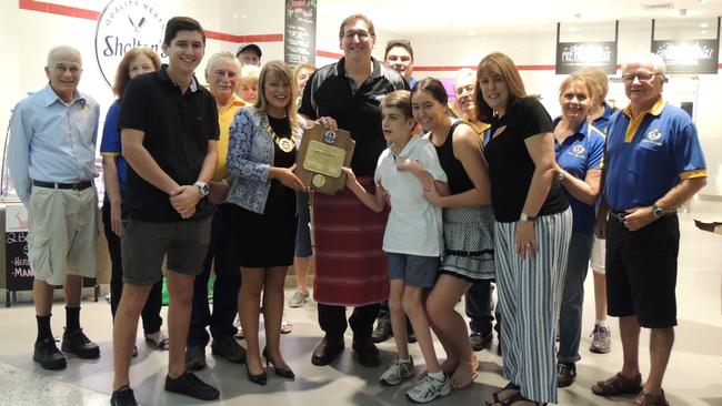 Matthew Wright of Shelton's Quality Meats in Castle Mall with members of the Castle Hill Lions Club, Hills Shire Mayor Yvonne Keane and his wife Michelle and their children Brayden, Nolan and Delaney.