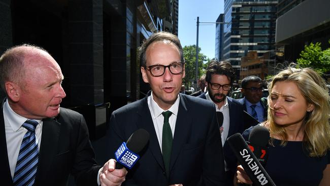 Australian Securities &amp; Investments Commission (ASIC) chairman James Shipton (centre) leaves the Royal Commission into Misconduct in the Banking, Superannuation and Financial Services Industry in Sydney. Picture: AAP