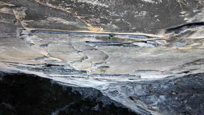 See that tiny green dot on the cliff face? That’s Alex Honnold, climbing with no ropes. Picture: Peter Mortimer / REEL ROCK Film Tour